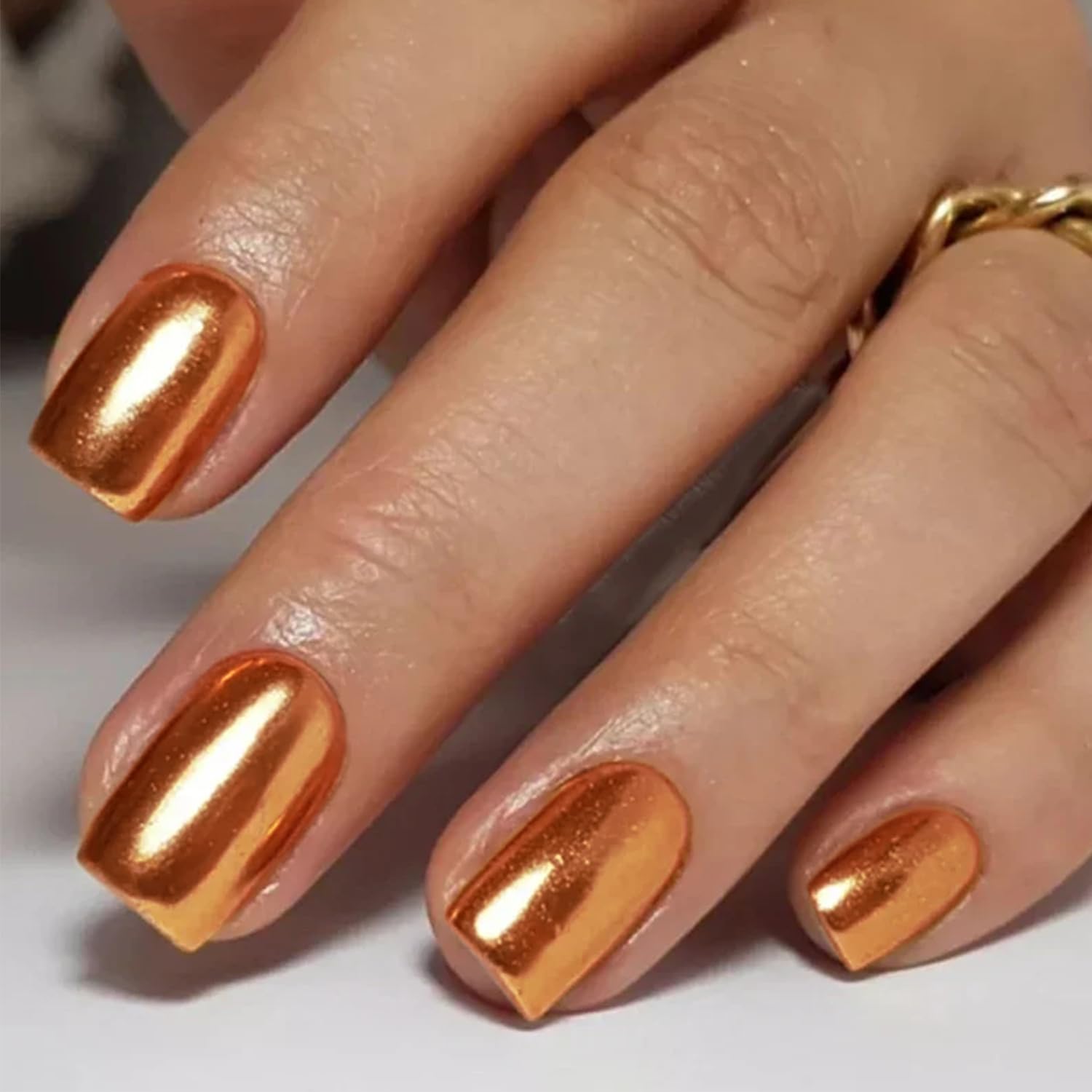 orange chrome nails