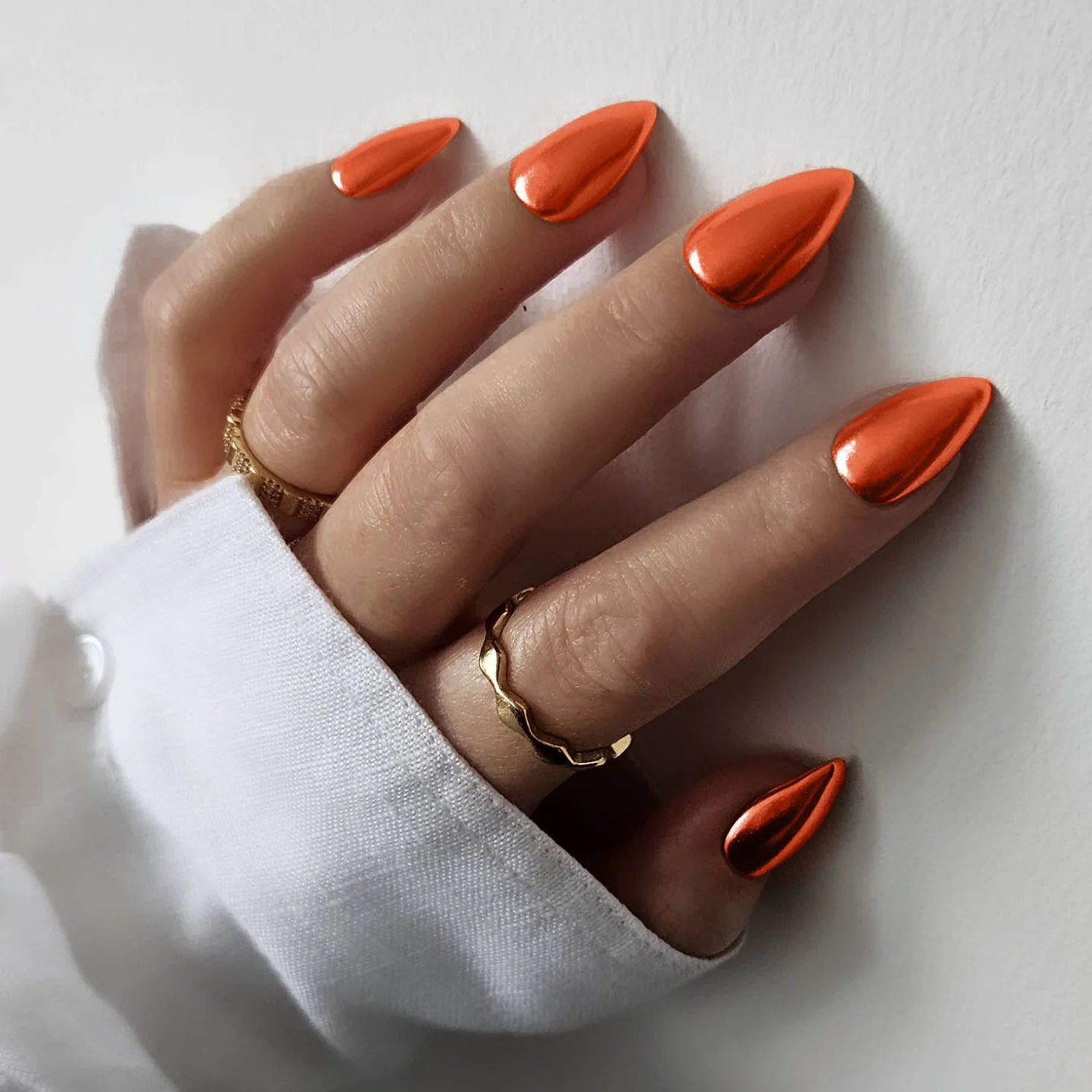 orange chrome nails